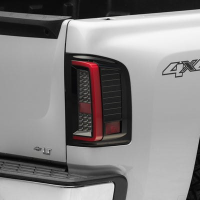 Raxiom 07-13 Chevy Silverado 1500 G2 LED Tail Lights- Black Housing (Clear Lens)