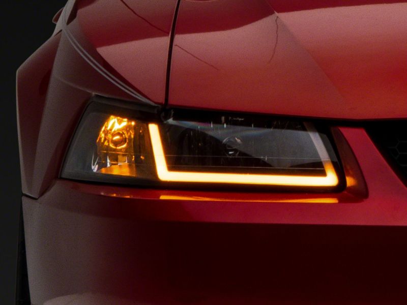 Raxiom 99-04 Ford Mustang Axial Series Headlights w/ Sequential LED Bar- Blk Housing (Clear Lens) Raxiom 99-04 Ford Mustang Axial Series Headlights w/ Sequential LED Bar- Blk Housing (Clear Lens)