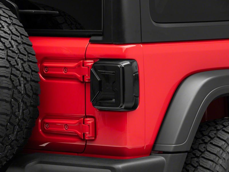 Raxiom 18-23 Jeep Wrangler JL Axial Series LED Tail Lights- Blk Housing (Smoked Lens) Raxiom 18-23 Jeep Wrangler JL Axial Series LED Tail Lights- Blk Housing (Smoked Lens)