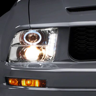 Raxiom 05-09 Ford Mustang Excluding GT500 LED Halo Projector Headlights- Chrome Housing (Clear Lens)