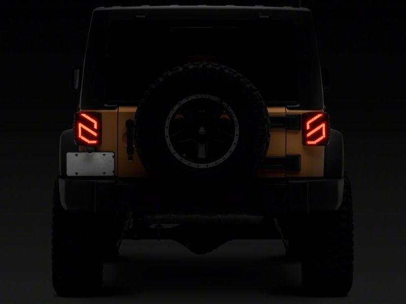 Raxiom 07-18 Jeep Wrangler JK Axial Series Trident LED Tail Lights- Blk Housing (Smoked Lens) Raxiom 07-18 Jeep Wrangler JK Axial Series Trident LED Tail Lights- Blk Housing (Smoked Lens)