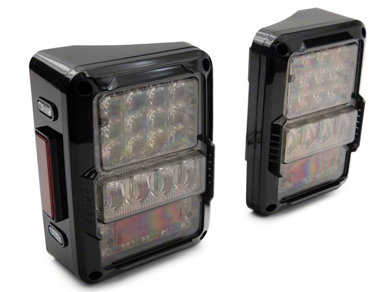 Raxiom 07-18 Jeep Wrangler JK Axial Series Lux LED Tail Lights- Blk Housing (Clear Lens) Raxiom 07-18 Jeep Wrangler JK Axial Series Lux LED Tail Lights- Blk Housing (Clear Lens)