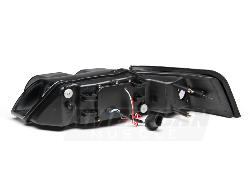Raxiom 99-04 Ford Mustang Dual LED Halo Projector Headlights- Black Housing (Smoked Lens) Raxiom 99-04 Ford Mustang Dual LED Halo Projector Headlights- Black Housing (Smoked Lens)