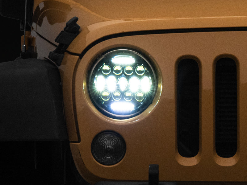 Raxiom 97-18 Jeep Wrangler TJ/JK Axial Series 13-LED Headlights- Black Housing (Clear Lens) Raxiom 97-18 Jeep Wrangler TJ/JK Axial Series 13-LED Headlights- Black Housing (Clear Lens)