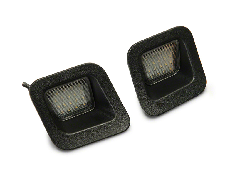 Raxiom 03-18 Dodge RAM 1500 Axial Series LED License Plate Lamps Raxiom 03-18 Dodge RAM 1500 Axial Series LED License Plate Lamps