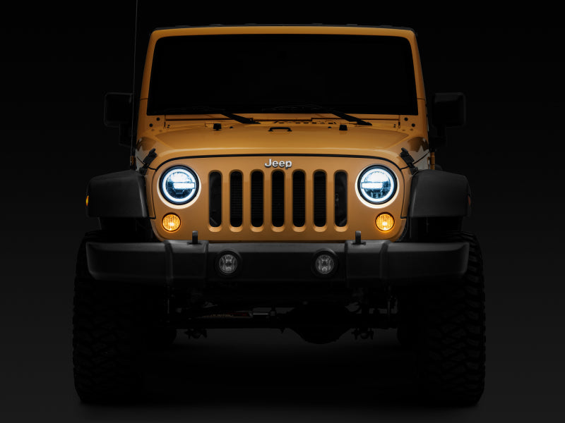 Raxiom 97-18 Jeep Wrangler TJ/JK 7-Inch LED Headlights w/ Halos- Black Housing (Clear Lens) Raxiom 97-18 Jeep Wrangler TJ/JK 7-Inch LED Headlights w/ Halos- Black Housing (Clear Lens)