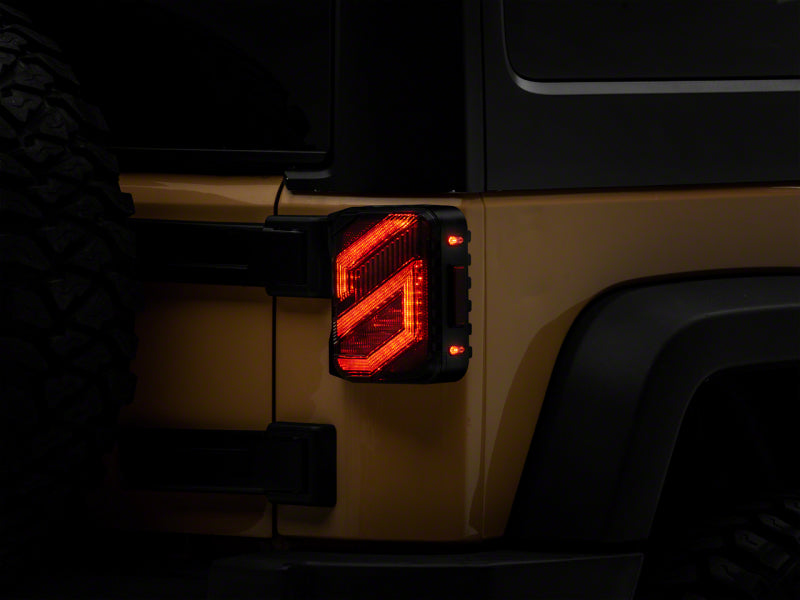 Raxiom 07-18 Jeep Wrangler JK Axial Series Trident LED Tail Lights- Blk Housing (Clear Lens) Raxiom 07-18 Jeep Wrangler JK Axial Series Trident LED Tail Lights- Blk Housing (Clear Lens)
