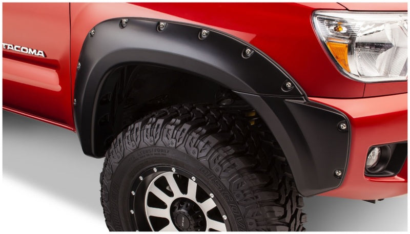 Bushwacker 12-15 Toyota Tacoma Fleetside Pocket Style Flares 4pc 73.5in Bed - Black Bushwacker 12-15 Toyota Tacoma Fleetside Pocket Style Flares 4pc 73.5in Bed - Black