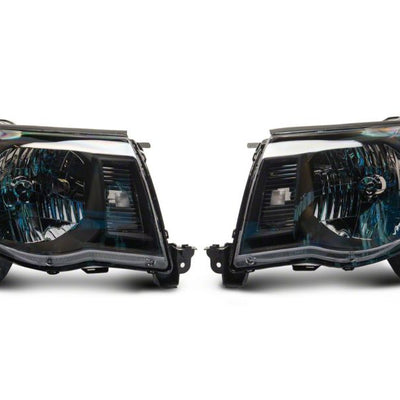 Raxiom 05-11 Toyota Tacoma Axial Series OE Replacement Headlights- Blk Housing (Clear Lens)