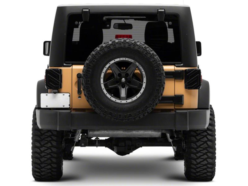 Raxiom 07-18 Jeep Wrangler JK Axial Series Trident LED Tail Lights- Blk Housing (Smoked Lens) Raxiom 07-18 Jeep Wrangler JK Axial Series Trident LED Tail Lights- Blk Housing (Smoked Lens)