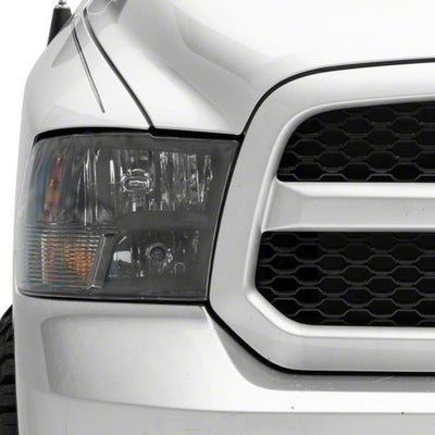 Raxiom 09-18 Dodge RAM 1500 Axial Series Euro Style Headlights w/ Dual Bulb Blk Housing (Clear Lens)