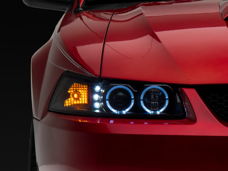 Raxiom 99-04 Ford Mustang Dual LED Halo Projector Headlights- Black Housing (Clear Lens) Raxiom 99-04 Ford Mustang Dual LED Halo Projector Headlights- Black Housing (Clear Lens)