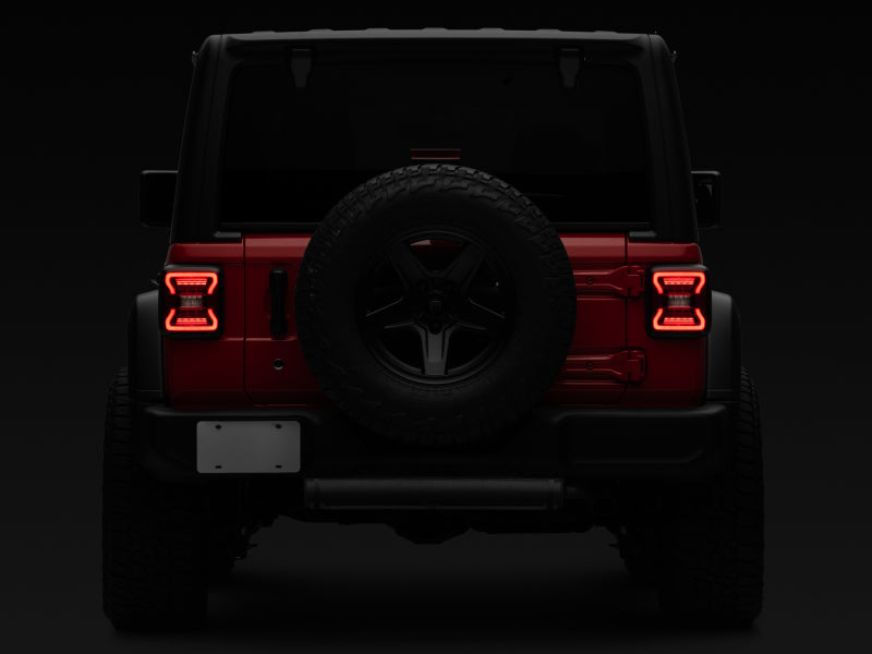 Raxiom 18-22 Jeep Wrangler JL LED Tail Lights- Black Housing - Red Lens Raxiom 18-22 Jeep Wrangler JL LED Tail Lights- Black Housing - Red Lens