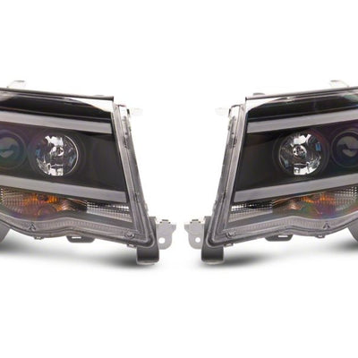 Raxiom 05-11 Toyota Tacoma Axial Series LED DRL Projector Headlights- Blk Housing (Clear Lens)