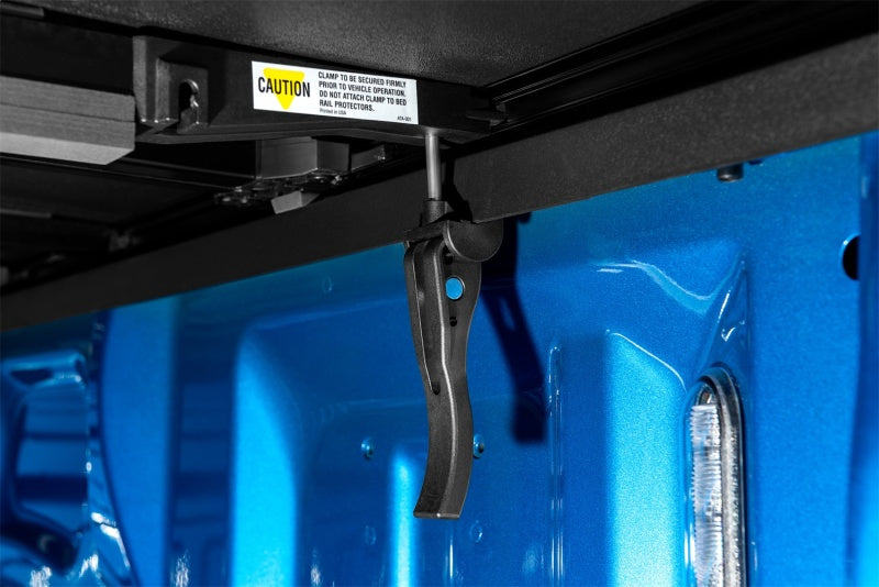 Lund 02-17 Dodge Ram 1500 Fleetside (6.4ft. Bed) Hard Fold Tonneau Cover - Black Lund 02-17 Dodge Ram 1500 Fleetside (6.4ft. Bed) Hard Fold Tonneau Cover - Black