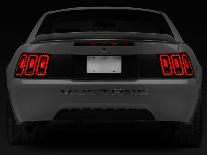 Raxiom 99-04 Ford Mustang Excluding 99-01 Cobra Icon LED Tail Lights- Black Housing (Smoked Lens) Raxiom 99-04 Ford Mustang Excluding 99-01 Cobra Icon LED Tail Lights- Black Housing (Smoked Lens)