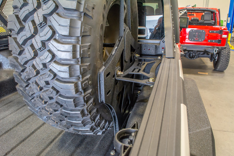 DV8 Offroad 2019+ Jeep Gladiator Universal Stand Up In-Bed Tire Carrier DV8 Offroad 2019+ Jeep Gladiator Universal Stand Up In-Bed Tire Carrier