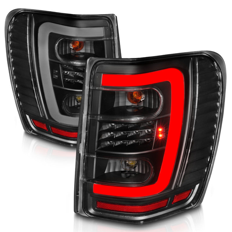 ANZO 1999-2004 Jeep Grand Cherokee LED Tail Lights w/ Light Bar Black Housing Clear Lens ANZO 1999-2004 Jeep Grand Cherokee LED Tail Lights w/ Light Bar Black Housing Clear Lens