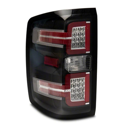 Raxiom 14-18 Chevrolet Silverado 1500 LED Taillights w/ SEQL Turn Signals- Blk Housing (Clear Lens)