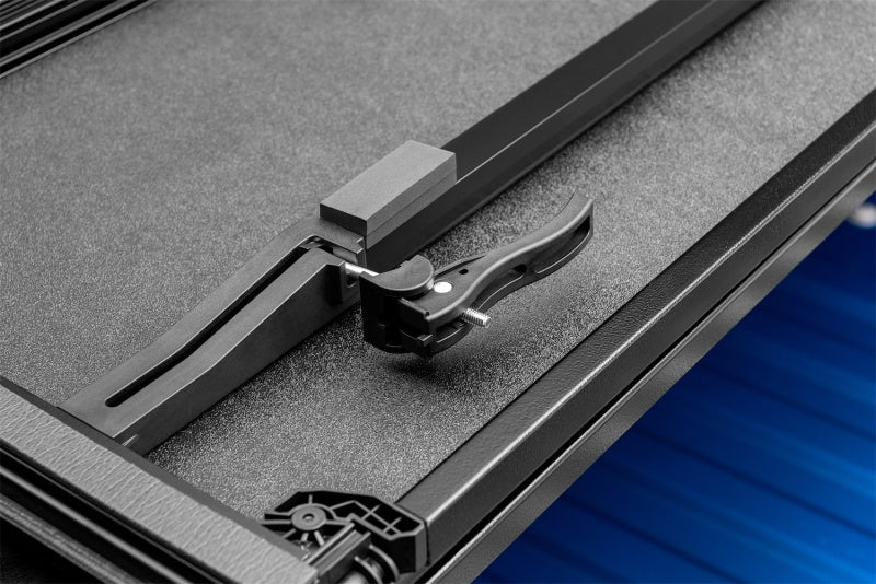 Lund 88-99 Chevy C1500 Fleetside (6.6ft. Bed) Hard Fold Tonneau Cover - Black Lund 88-99 Chevy C1500 Fleetside (6.6ft. Bed) Hard Fold Tonneau Cover - Black