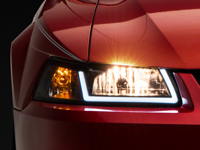 Raxiom 99-04 Ford Mustang Axial Series Headlights w/ LED Bar- Blk Housing (Clear Lens) Raxiom 99-04 Ford Mustang Axial Series Headlights w/ LED Bar- Blk Housing (Clear Lens)