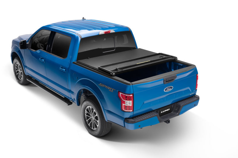 Lund 02-17 Dodge Ram 1500 Fleetside (6.4ft. Bed) Hard Fold Tonneau Cover - Black Lund 02-17 Dodge Ram 1500 Fleetside (6.4ft. Bed) Hard Fold Tonneau Cover - Black