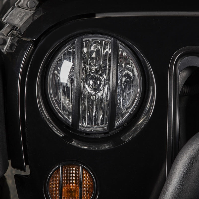 Rugged Ridge 07-18 Jeep Wrangler JK Black Elite Pivotal Headlight Euro Guard Rugged Ridge 07-18 Jeep Wrangler JK Black Elite Pivotal Headlight Euro Guard