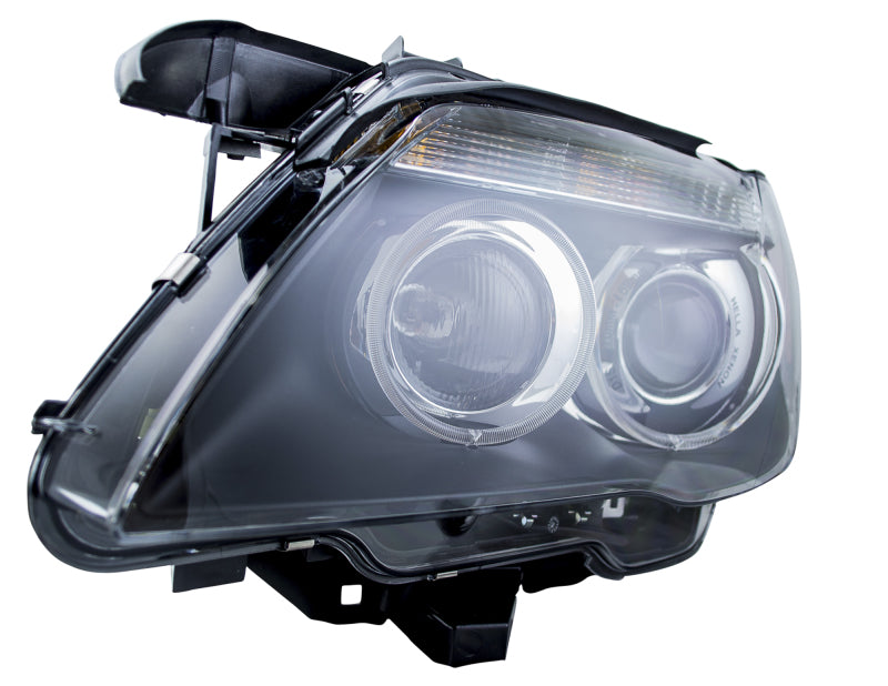 Hella 02-07 BMW 7 Series Bi-Xenon Headlight Left Clear Turn Signal Hella 02-07 BMW 7 Series Bi-Xenon Headlight Left Clear Turn Signal