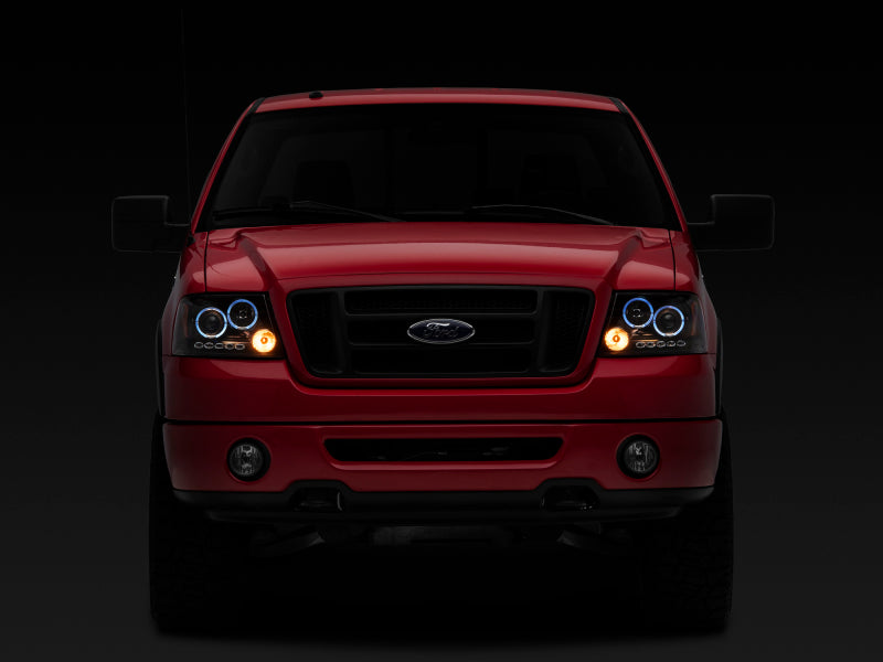 Raxiom 04-08 Ford F-150 Dual LED Halo Projector Headlights- Black Housing (Clear Lens) Raxiom 04-08 Ford F-150 Dual LED Halo Projector Headlights- Black Housing (Clear Lens)