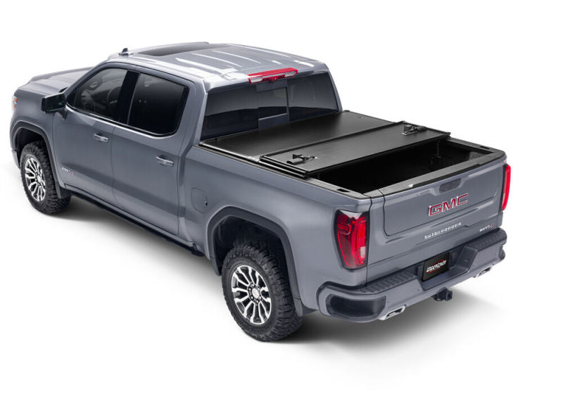 UnderCover 05-21 Nissan Frontier 6ft w/ Factory Cargo Management System Triad Bed Cover UnderCover 05-21 Nissan Frontier 6ft w/ Factory Cargo Management System Triad Bed Cover