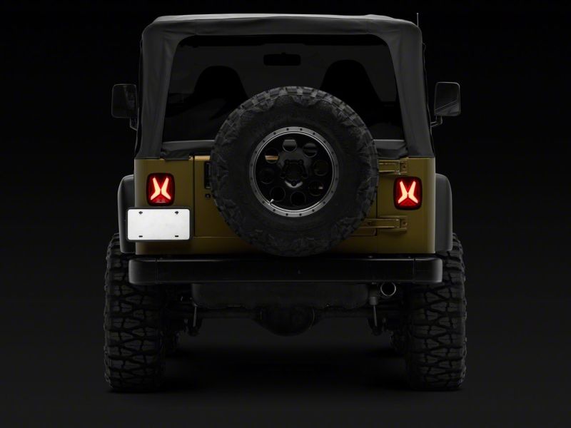 Raxiom 76-06 Jeep CJ7 Wrangler YJ & TJ Gladiator LED Tail Lights- Blk Housing (Smoked Lens) Raxiom 76-06 Jeep CJ7 Wrangler YJ & TJ Gladiator LED Tail Lights- Blk Housing (Smoked Lens)