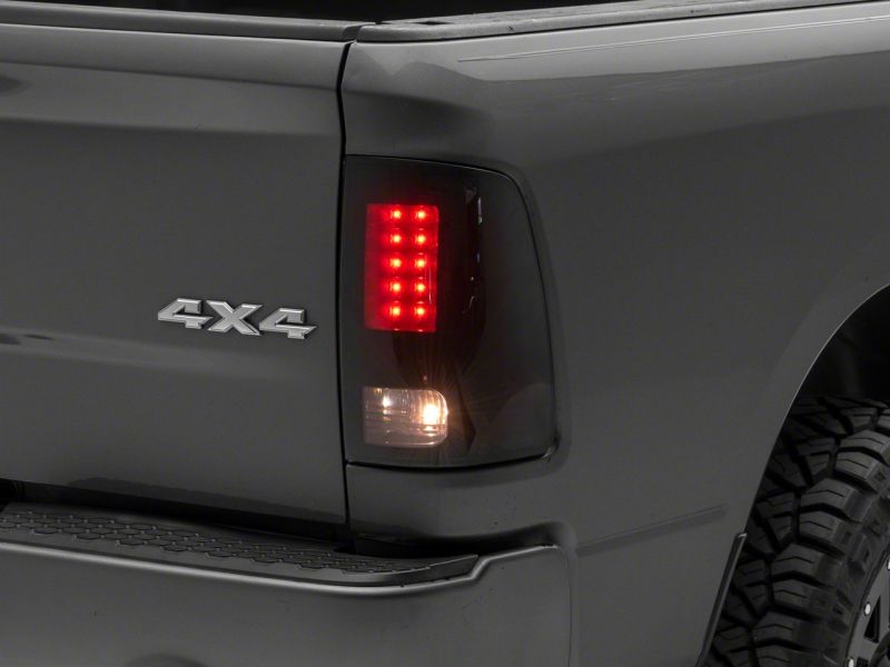 Raxiom 09-18 Dodge RAM 1500/2500/3500 Axial Series LED Tail Lights- BlkHousing- SmokedLens Raxiom 09-18 Dodge RAM 1500/2500/3500 Axial Series LED Tail Lights- BlkHousing- SmokedLens