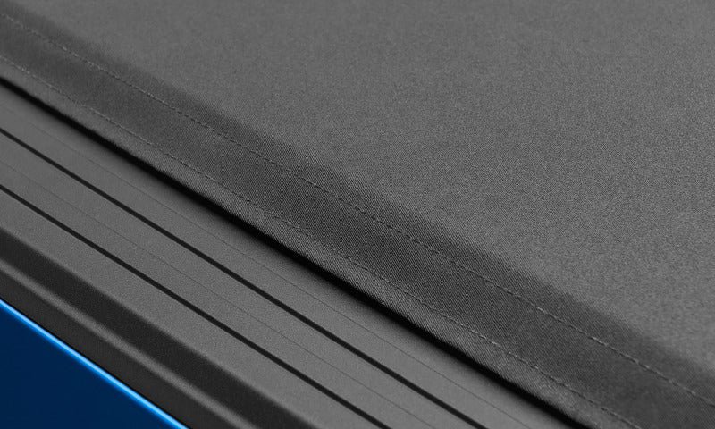 Lund 02-17 Dodge Ram 1500 (6.5ft. Bed) Genesis Elite Roll Up Tonneau Cover - Black Lund 02-17 Dodge Ram 1500 (6.5ft. Bed) Genesis Elite Roll Up Tonneau Cover - Black