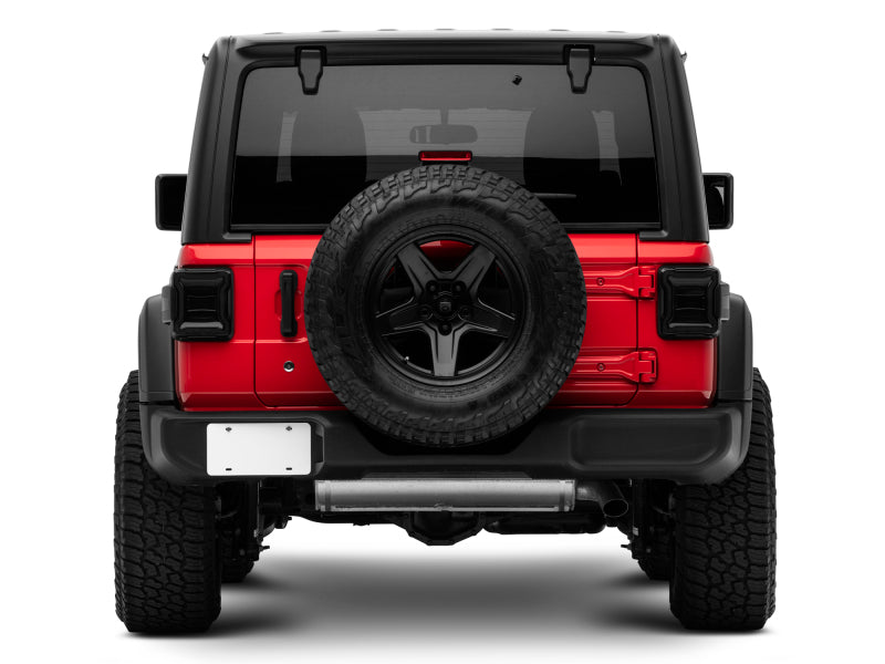 Raxiom 18-22 Jeep Wrangler JL LED Tail Lights- Black Housing (Smoked Lens) Raxiom 18-22 Jeep Wrangler JL LED Tail Lights- Black Housing (Smoked Lens)