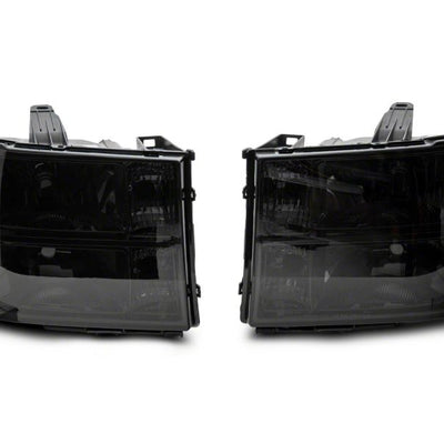 Raxiom 07-14 GMC Sierra 1500/2500 HD/3500 HD Axial OEM Rep Headlights- Chrome Housing- Smoked Lens