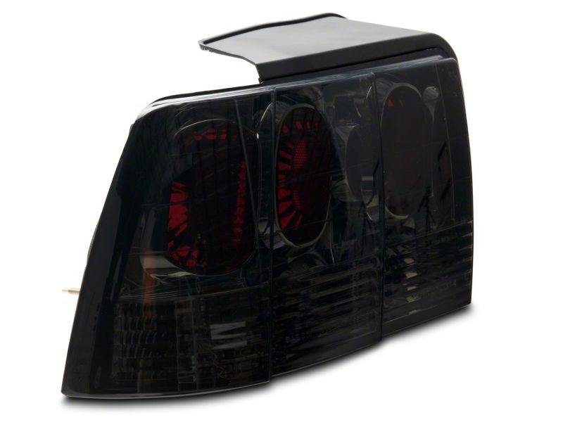 Raxiom 99-04 Ford Mustang Axial Series Altezza Style Tail Lights- Blk Housing (Smoked Lens) Raxiom 99-04 Ford Mustang Axial Series Altezza Style Tail Lights- Blk Housing (Smoked Lens)