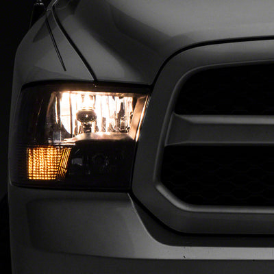 Raxiom 09-18 Dodge RAM 1500 Axial Series Euro Style Headlights w/ Dual Bulb Blk Housing (Clear Lens)
