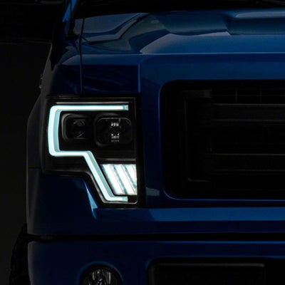 Raxiom 09-14 Ford F-150 Axial G4 Light Bar Switchback Projector Headlights- Blk Housing (Clear Lens)