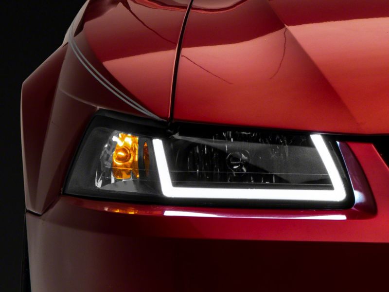 Raxiom 99-04 Ford Mustang Axial Series Headlights w/ LED Bar- Blk Housing (Clear Lens) Raxiom 99-04 Ford Mustang Axial Series Headlights w/ LED Bar- Blk Housing (Clear Lens)