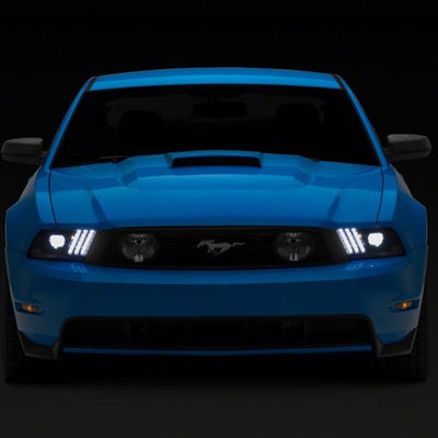 Raxiom 10-12 Ford Mustang LED Projector Headlights SEQL Turn Signals- Blk Housing (Clear Lens)