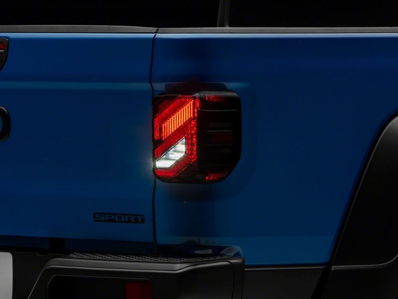Raxiom 20-23 Jeep Gladiator JT Axial Series LED Tail Lights- Blk Housing (Smoked Lens) Raxiom 20-23 Jeep Gladiator JT Axial Series LED Tail Lights- Blk Housing (Smoked Lens)