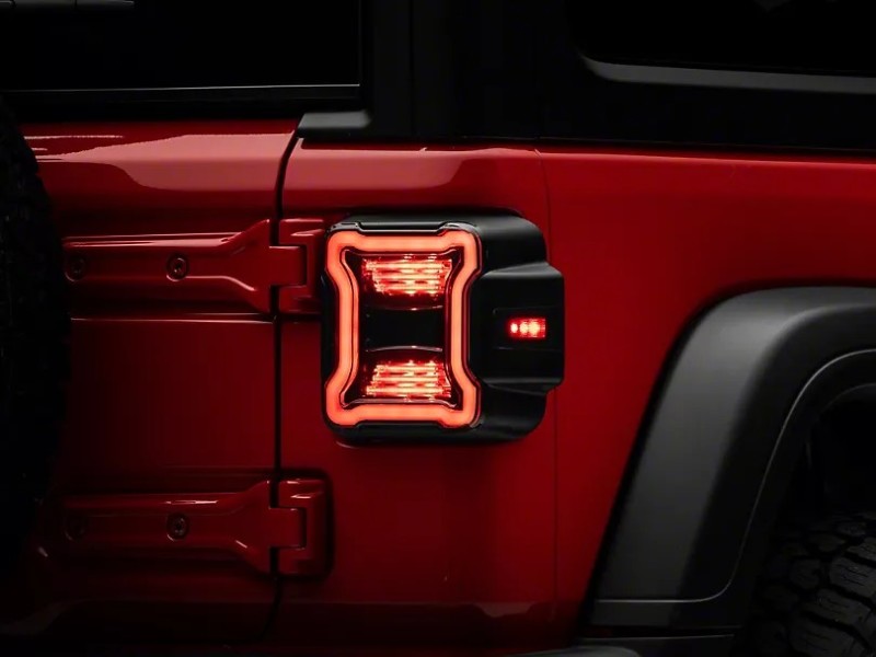 Raxiom 18-22 Jeep Wrangler JL LED Tail Lights- Black Housing (Smoked Lens) Raxiom 18-22 Jeep Wrangler JL LED Tail Lights- Black Housing (Smoked Lens)