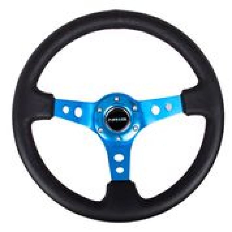 NRG Reinforced Steering Wheel (350mm / 3in. Deep) Blk Leather w/Blue Circle Cutout Spokes NRG Reinforced Steering Wheel (350mm / 3in. Deep) Blk Leather w/Blue Circle Cutout Spokes