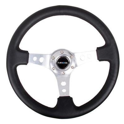 NRG Reinforced Steering Wheel (350mm / 3in. Deep) Blk Leather w/Silver Spoke & Circle Cutouts