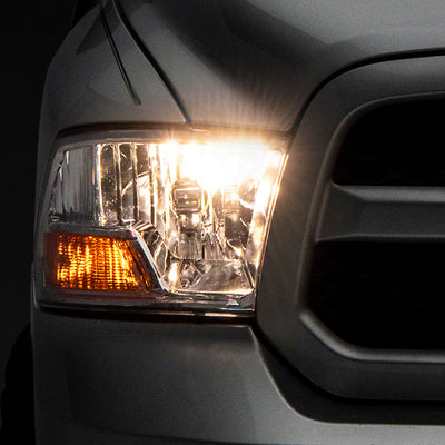 Raxiom 09-18 Dodge RAM 1500 Axial OEM Rep Headlights w/ Single Bulb- Chrome Housing (Clear Lens)
