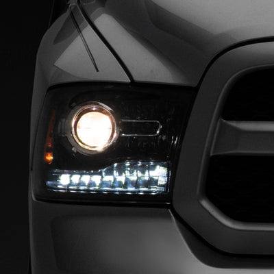Raxiom 09-18 Dodge RAM 1500 LED Halo Headlights w/Switchback Turn Signals- Blk Housing (Clear Lens)
