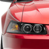Raxiom 99-04 Ford Mustang Dual LED Halo Projector Headlights- Black Housing (Clear Lens)