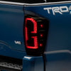 Raxiom 16-23 Toyota Tacoma LED Tail Lights- Blk Housing (Smoked Lens)