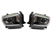 Raxiom 14-21 Toyota Tundra Axial Projector Headlights w/ SEQL LED Bar- Black Housing (Clear Lens)