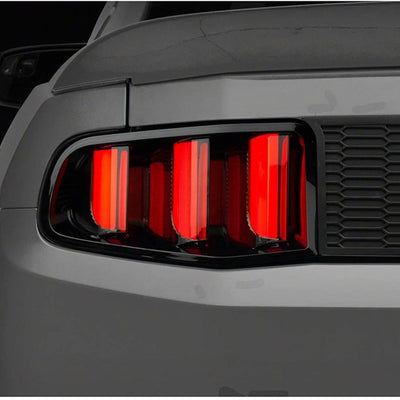 Raxiom 10-12 Ford Mustang Vector V2 LED Tail Lights - Gloss Black Housing (Clear Lens)